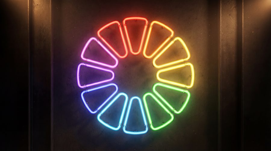 Glowing neon color wheel on a dark background